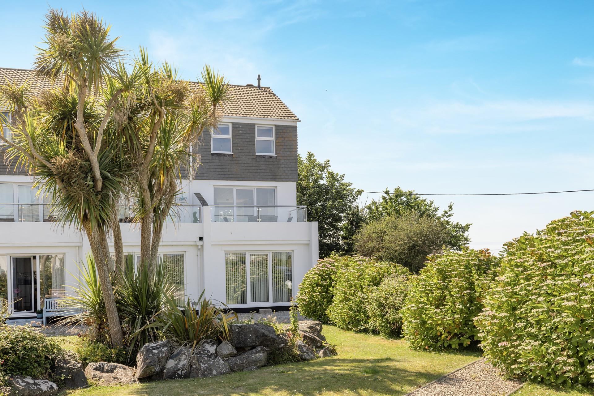 Come back from the beach and soak up the evening sun in the garden.