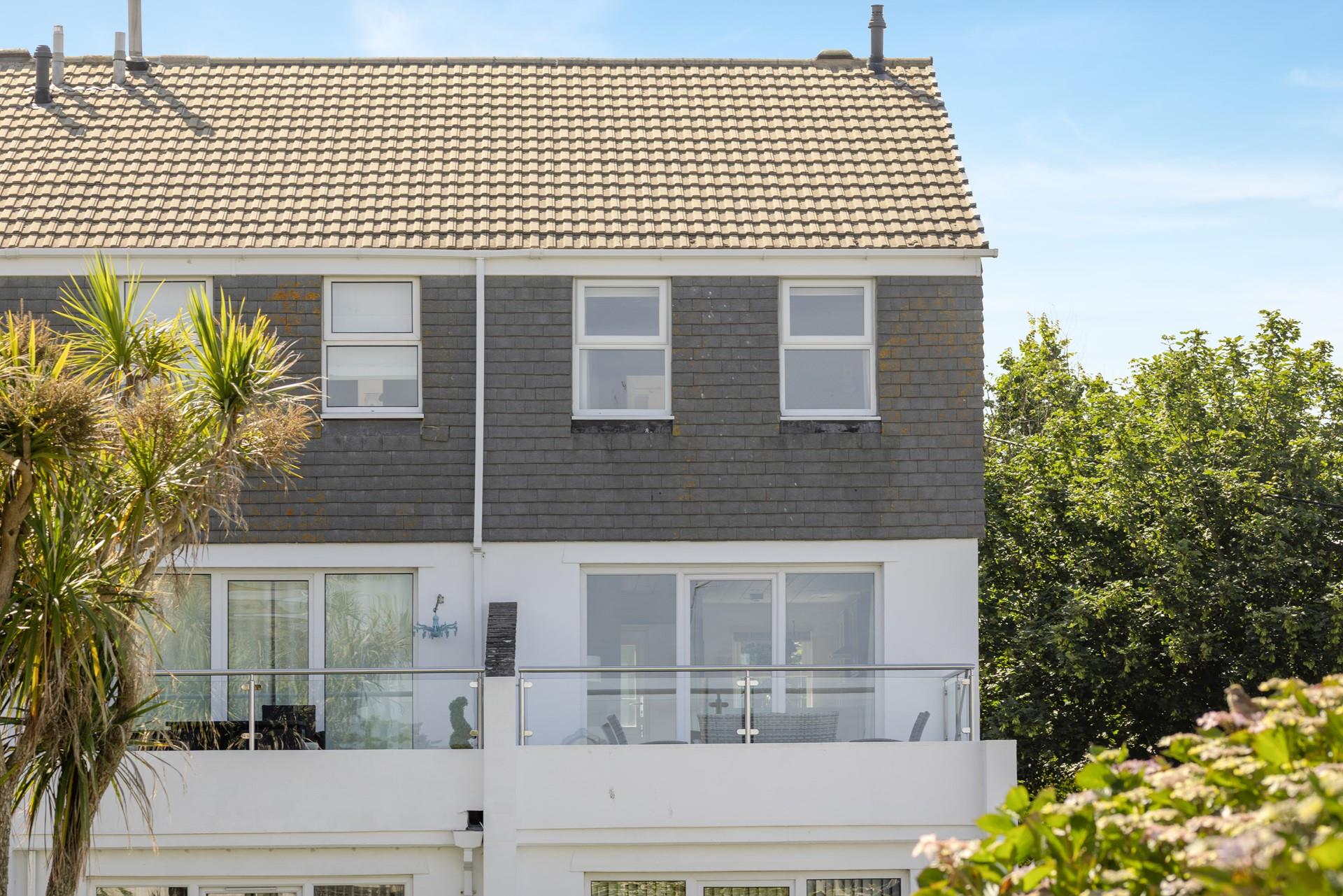 The sun-trap balcony is a great spot for a sundowner!