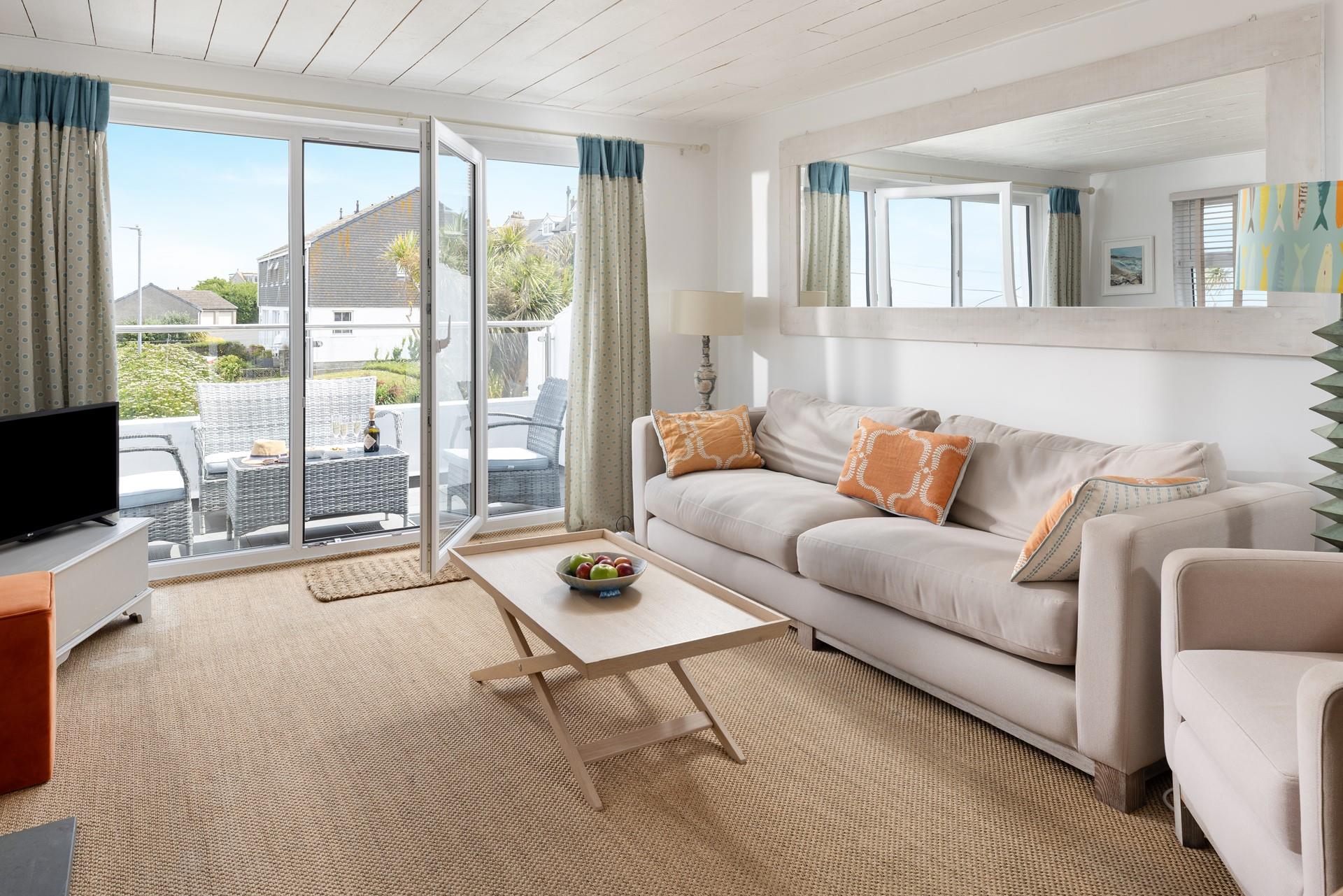 There is plenty of space on the sofa for all the family to relax.