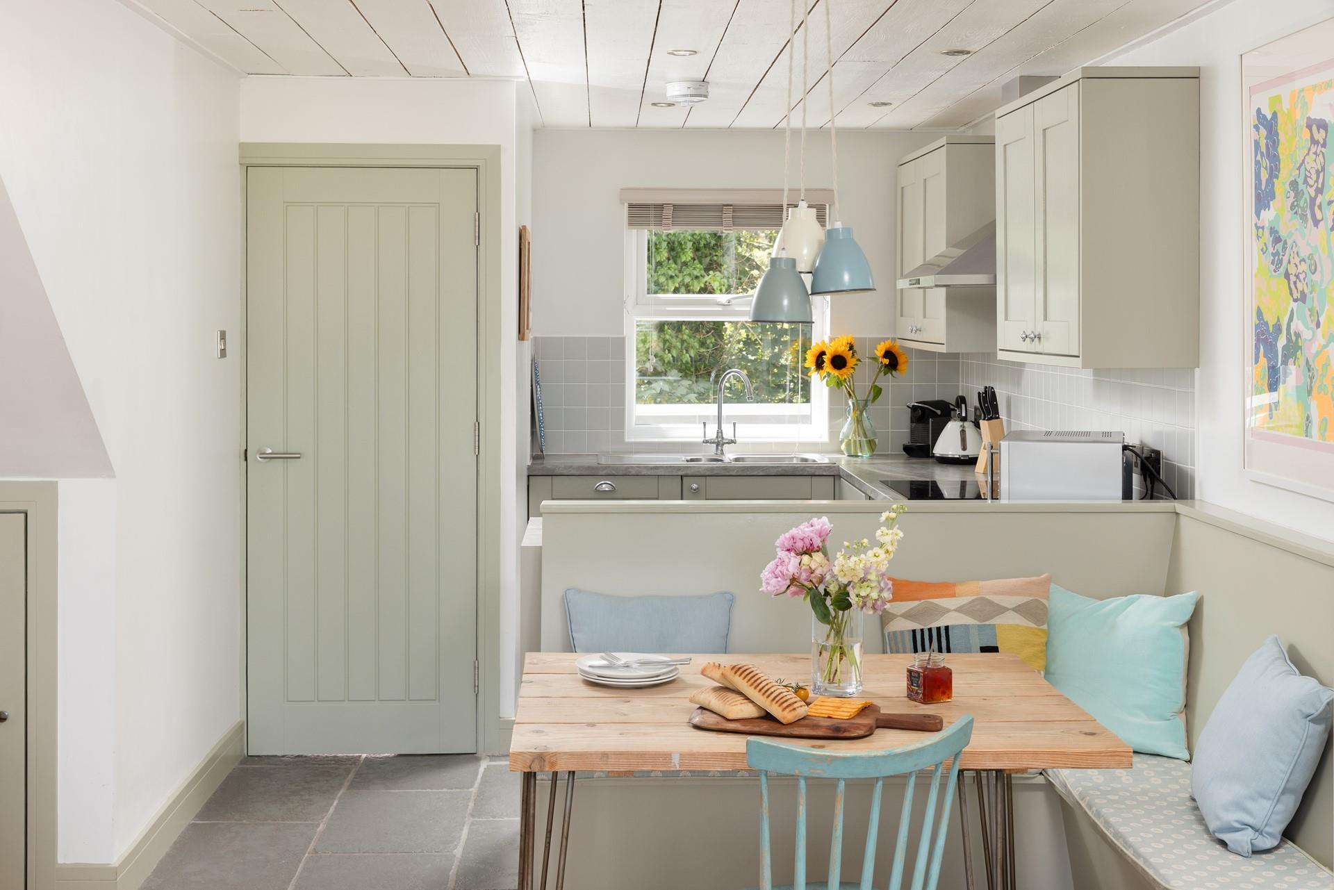 Cook and dine together in the cheerful kitchen and dining space.