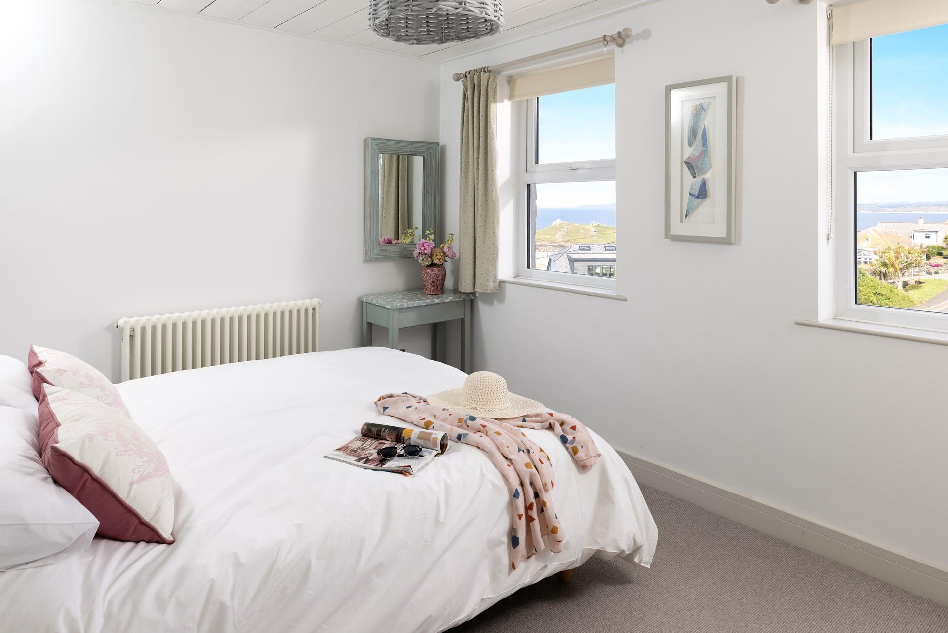 Wake up, throw back the curtains and gaze out towards Godrevy Lighthouse. 