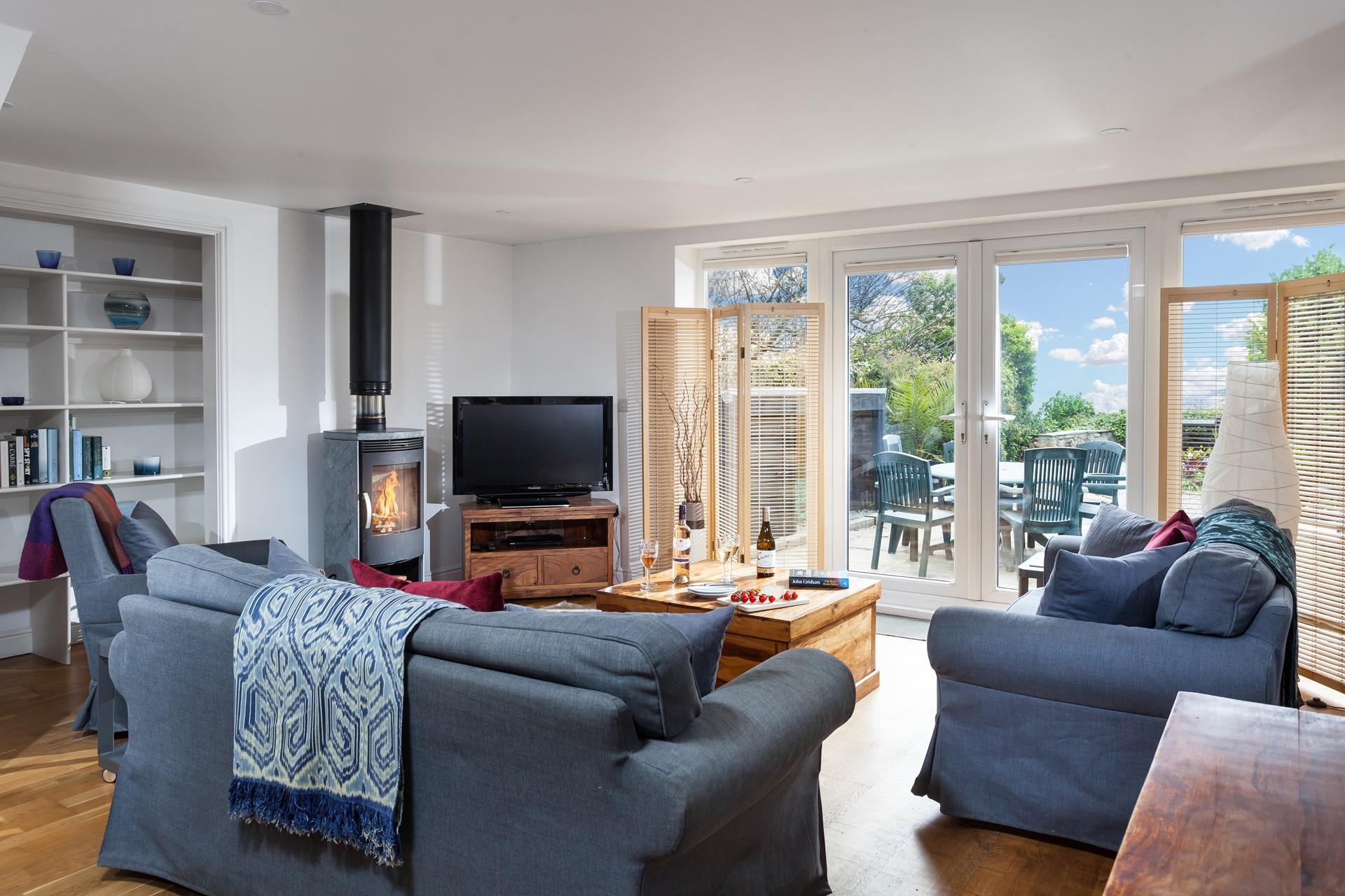 Light the woodburner and watch the amber flames crackle while you sip a glass of wine.