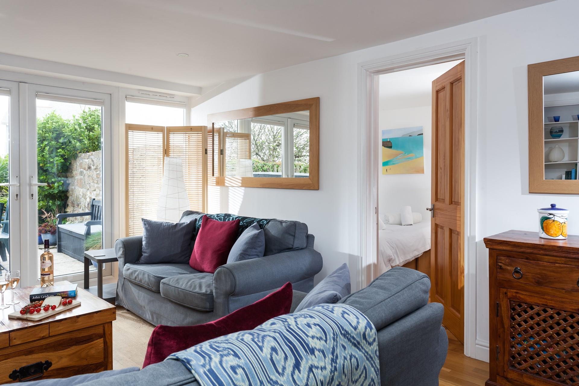 Curl up with a good book while the fresh sea breeze runs through the property.