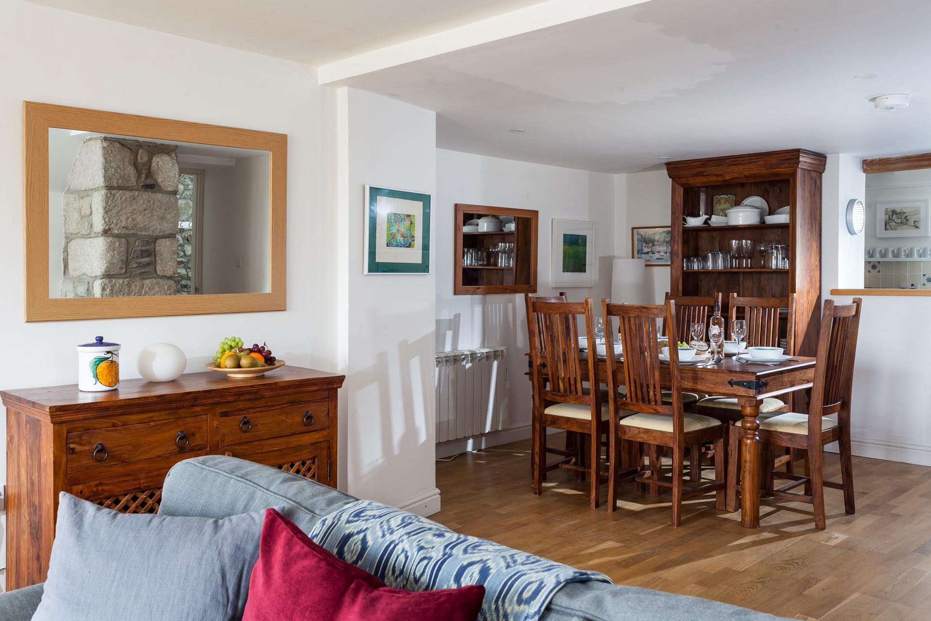 Lovely wooden furnishings and colourful artwork create a home-from-home feel.