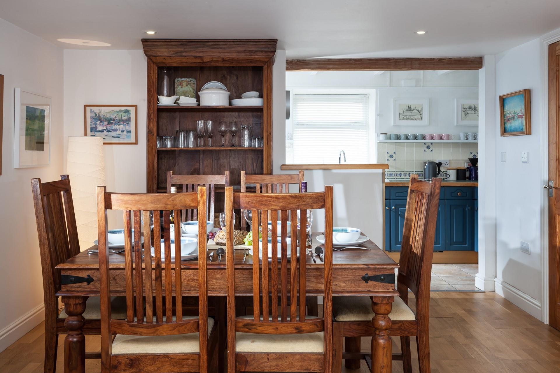 Gather around the dining table and enjoy a delicious meal with your family.