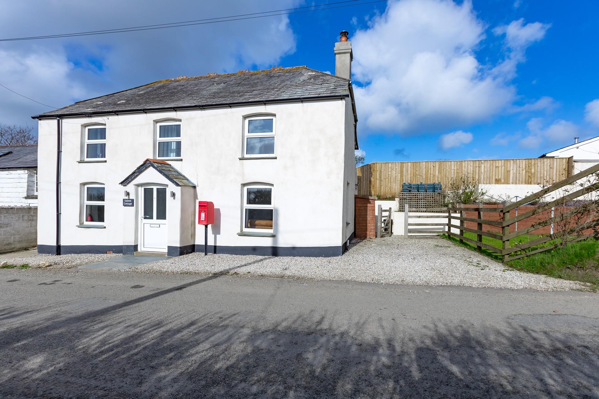 Salem Cottage is nestled on a quiet lane with plenty of parking for two cars.
