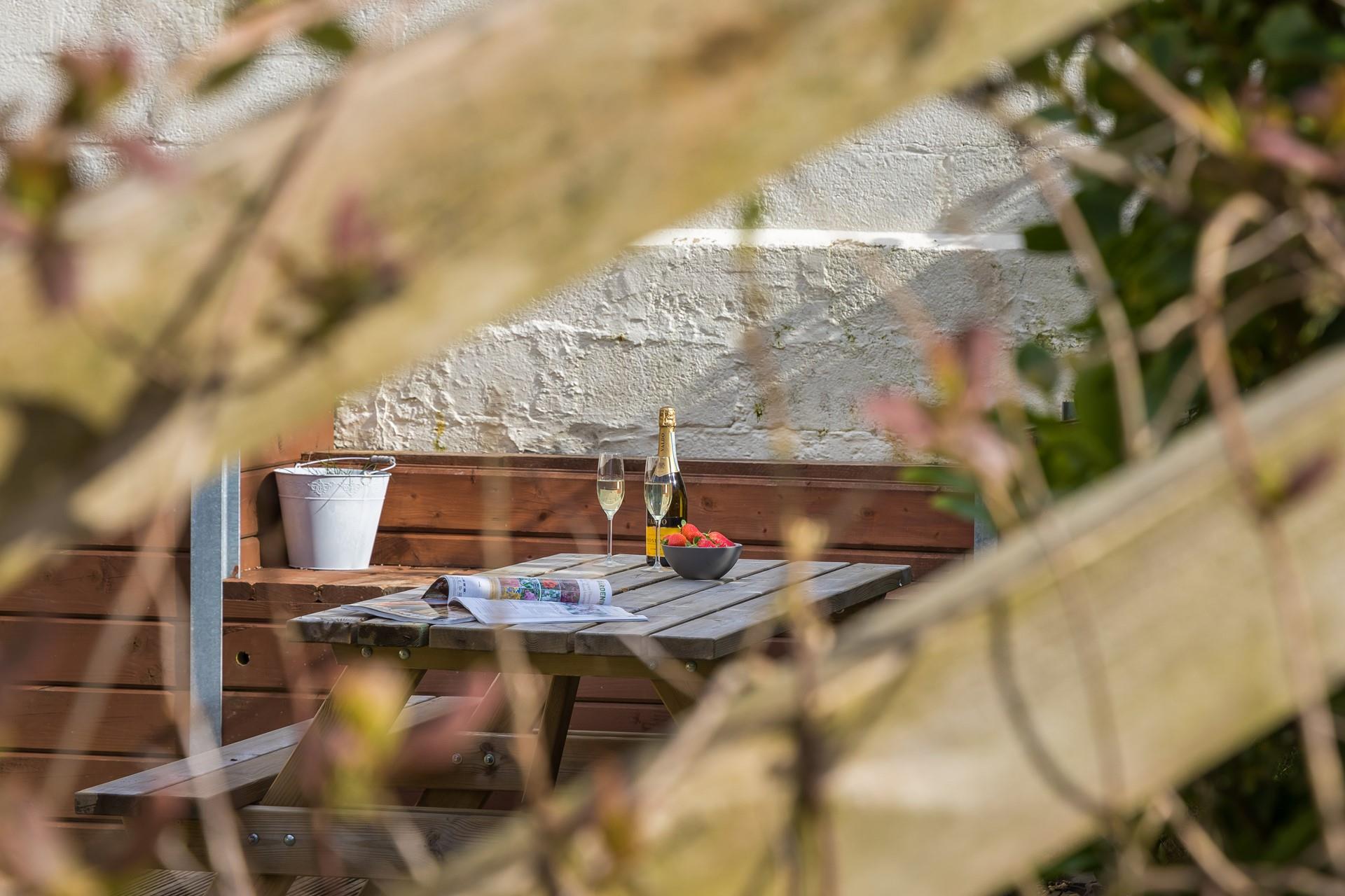 Enjoy some al fresco drinks and nibbles in the garden.