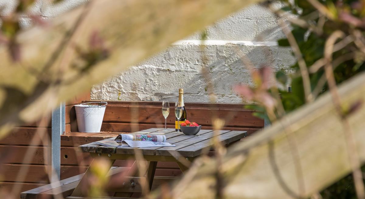 Enjoy some al fresco drinks and nibbles in the garden.