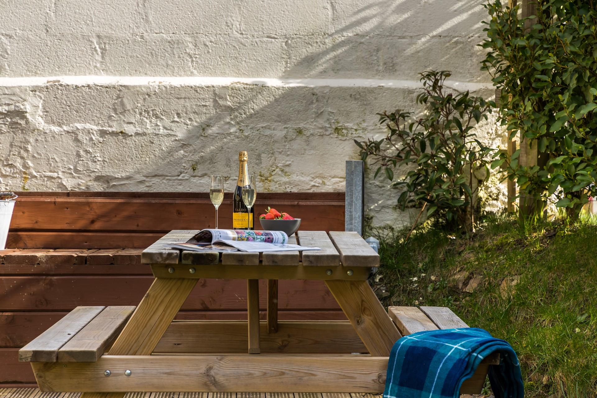 Pour yourself a glass of bubbles and soak up the afternoon sun.