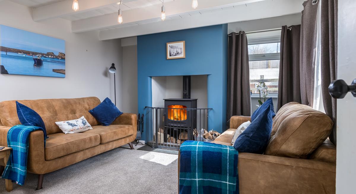 Listen to the crackle of the woodburner in the cooler months in the cosy sitting room.