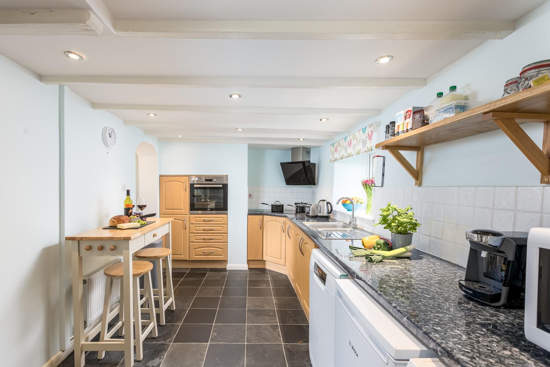 The kitchen has lots of worktop space to rustle up tasty meals.