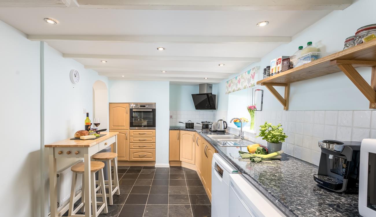 The kitchen has lots of worktop space to rustle up tasty meals.