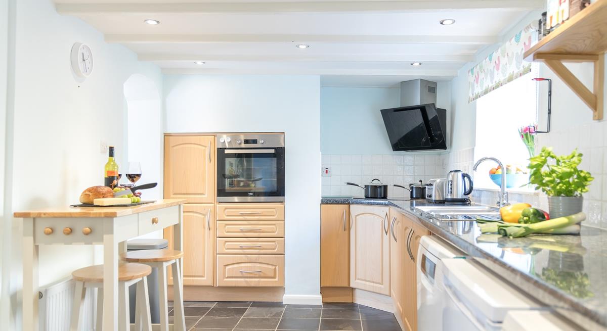 Let the chef of the family cook up a storm in the well-equipped kitchen.