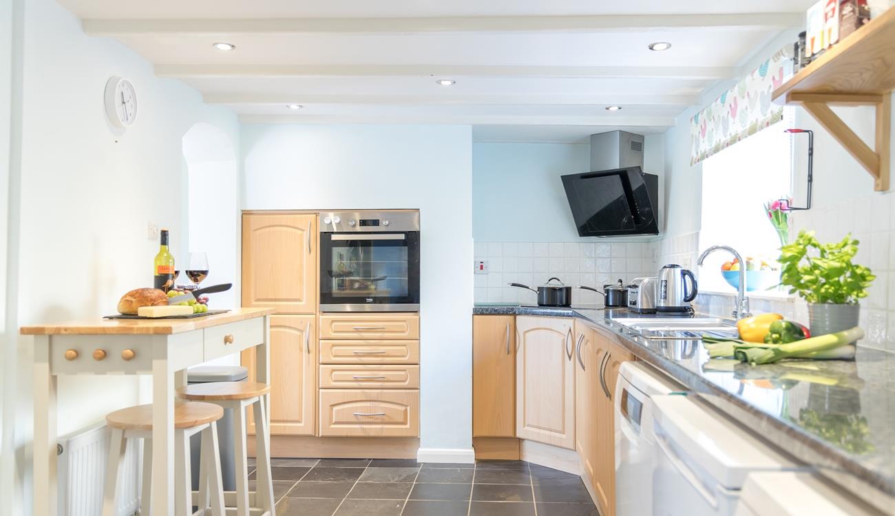 Let the chef of the family cook up a storm in the well-equipped kitchen.