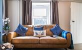After spending the day on Widemouth Bay beach, come back to snuggle up on the sofa. - Thumbnail Image