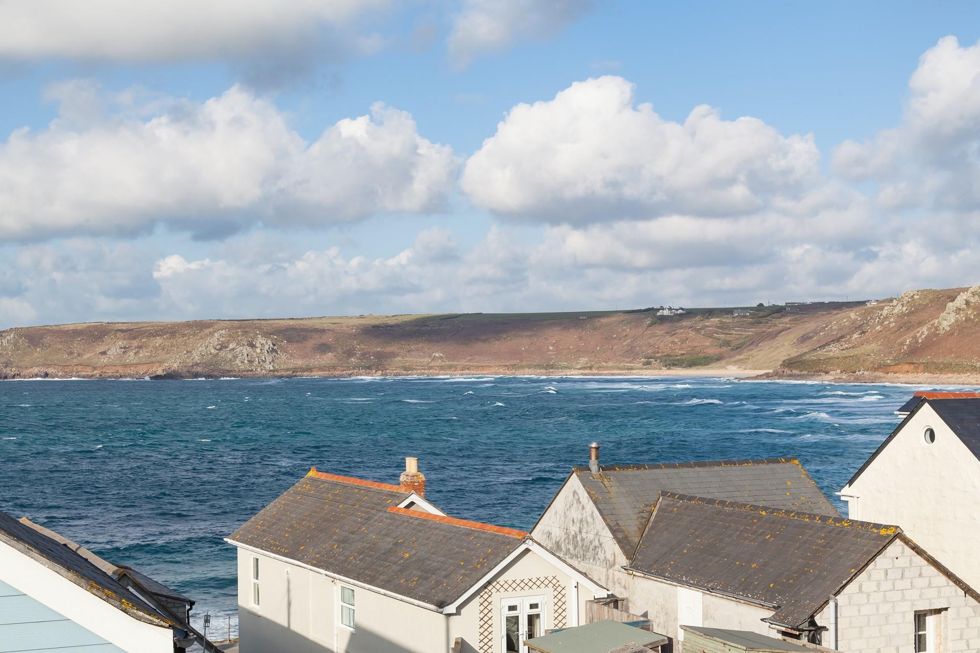 Enjoy far-reaching sea views from the comfortable sitting room.
