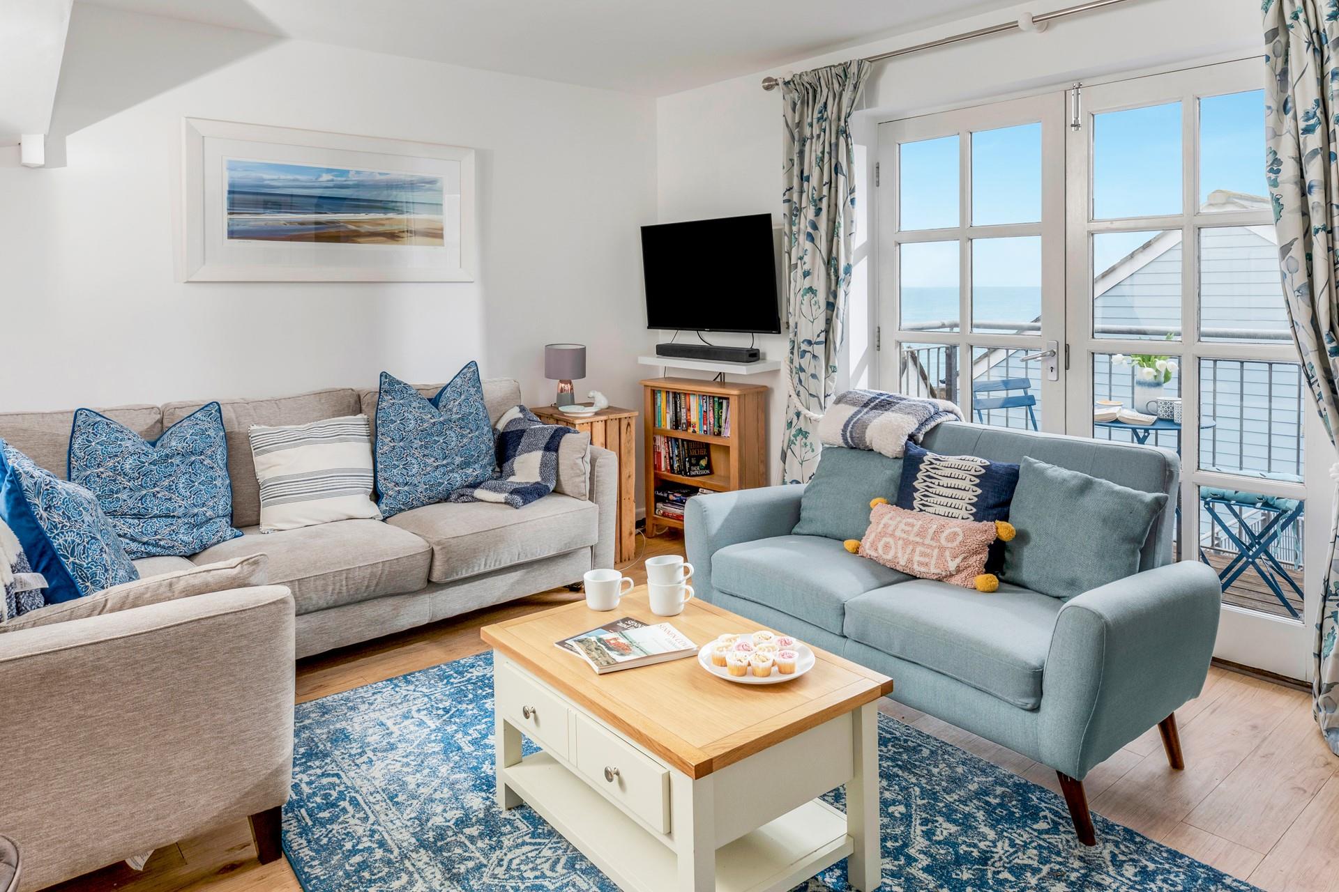 The cosy sitting room is the ideal space to relax and unwind in the evening.