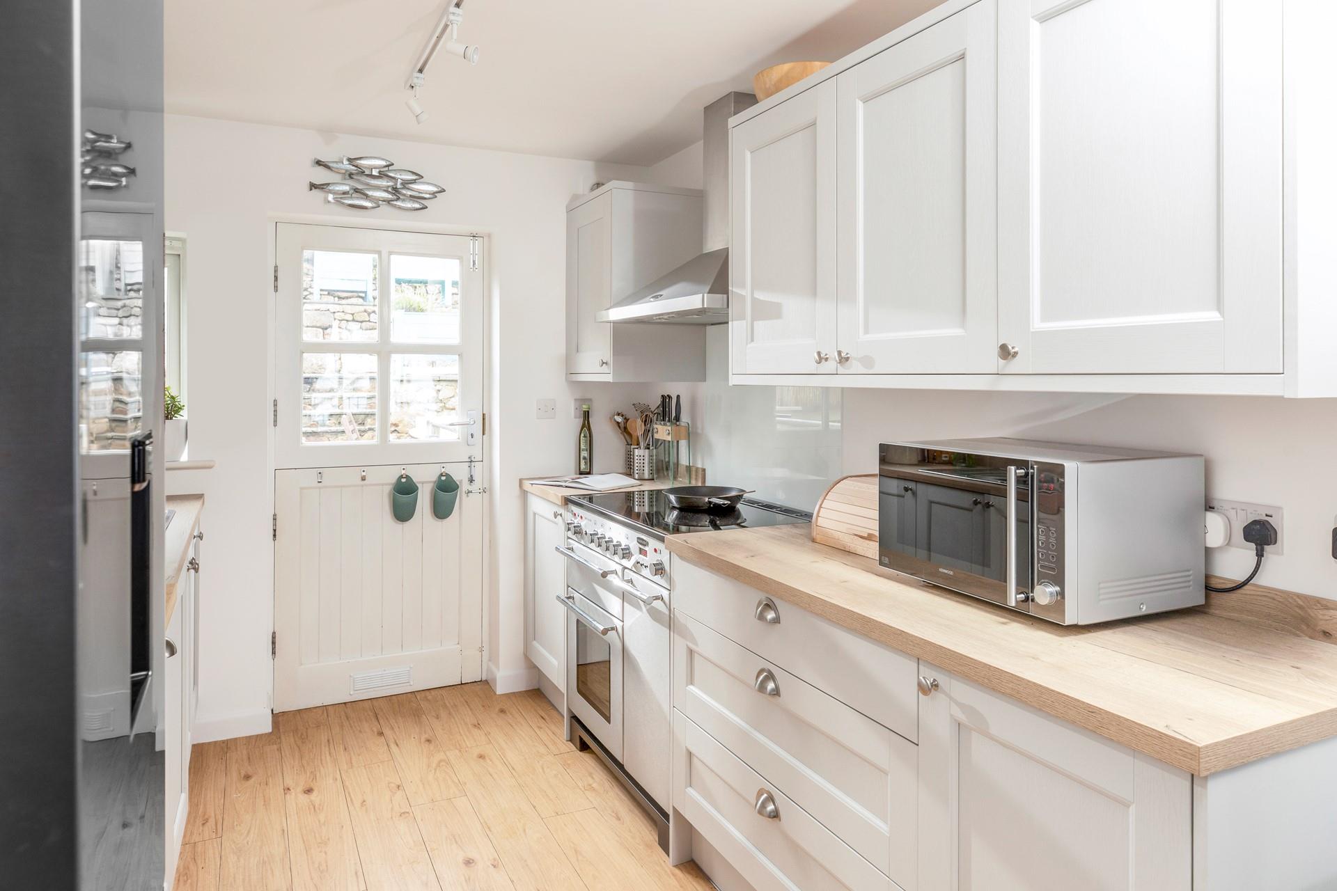 The kitchen is well-equipped for all your culinary needs.