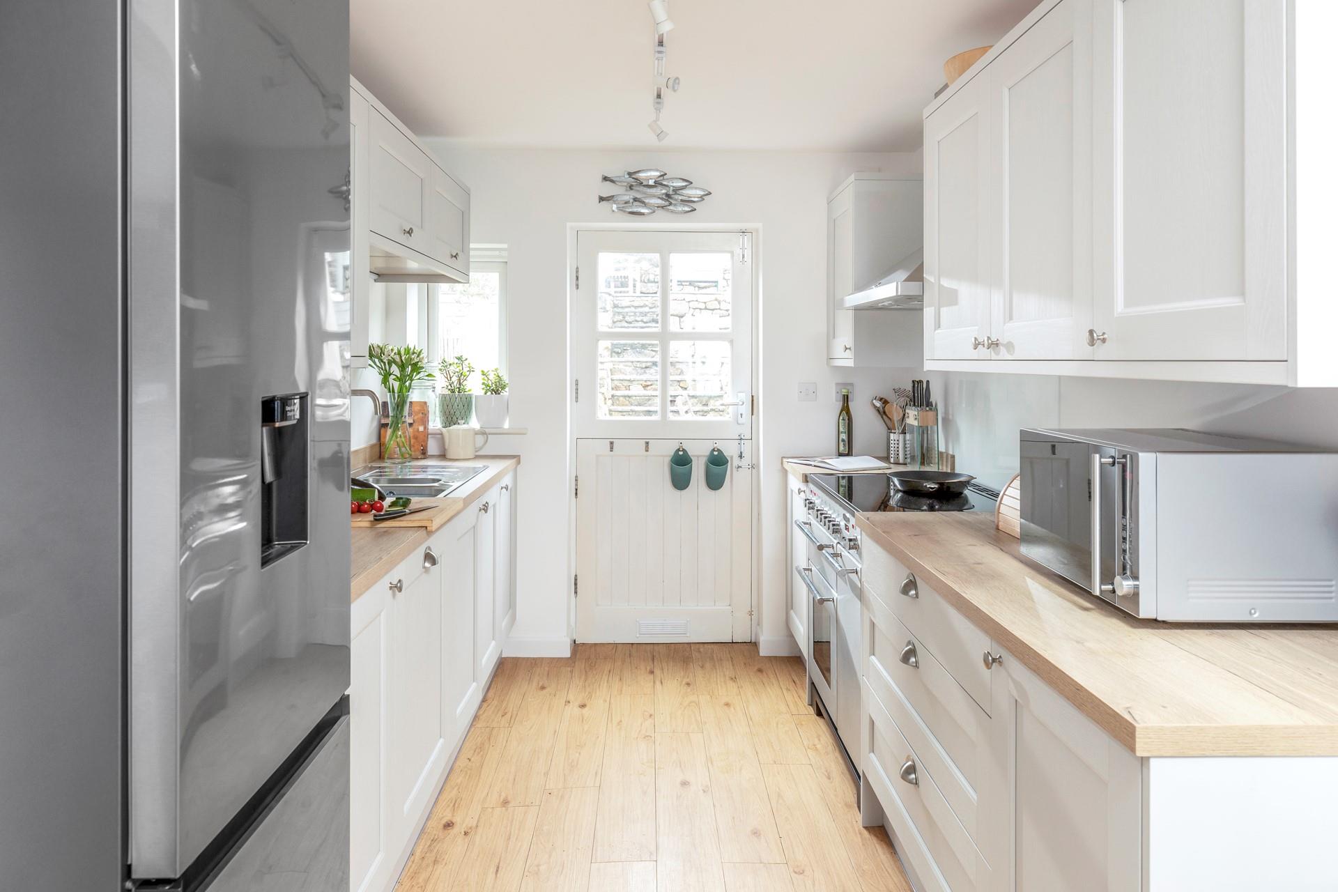 The modern kitchen has all the appliances needed to cook up a storm.