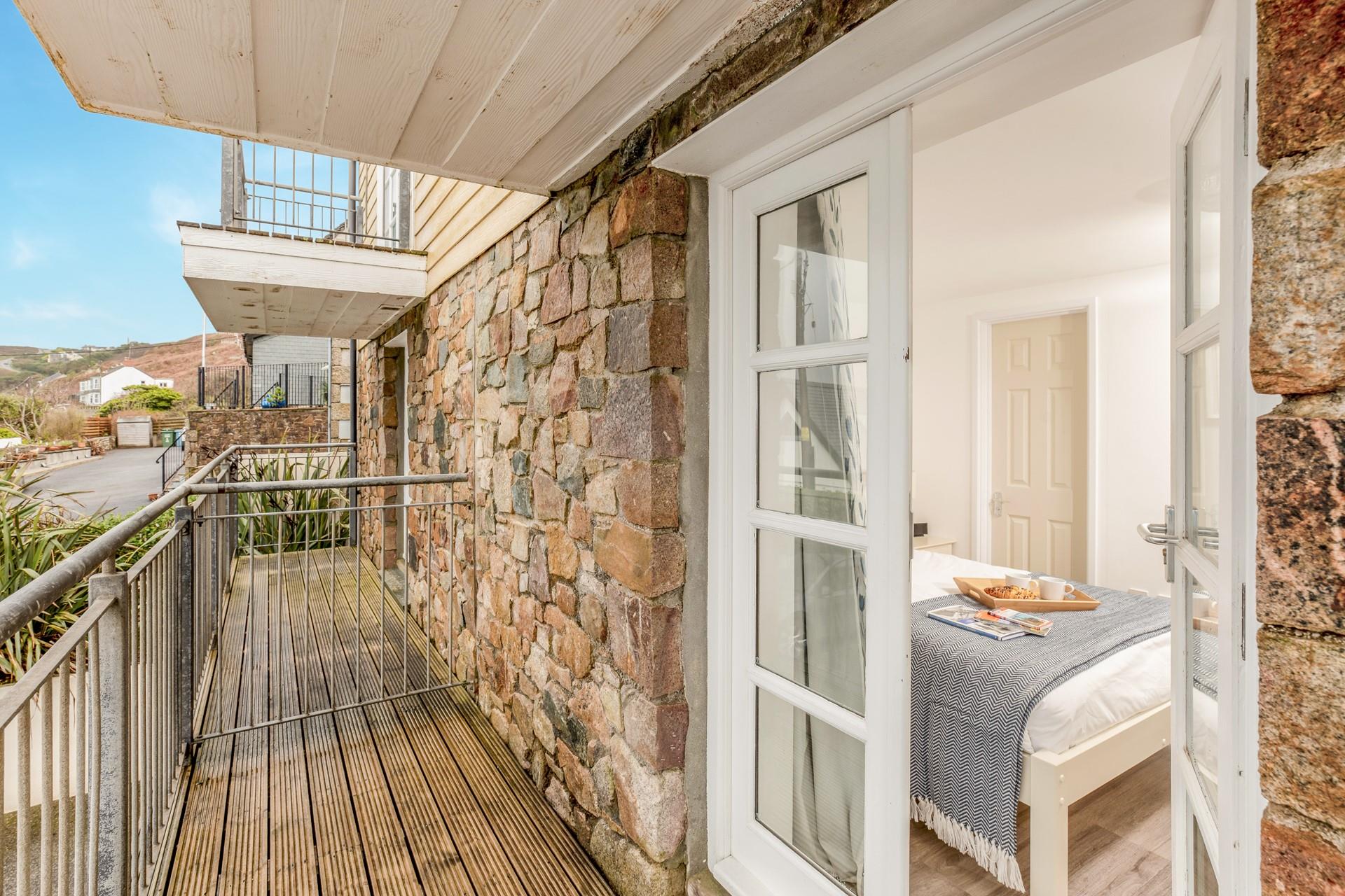 Open the balcony doors and let the fresh sea breeze in.