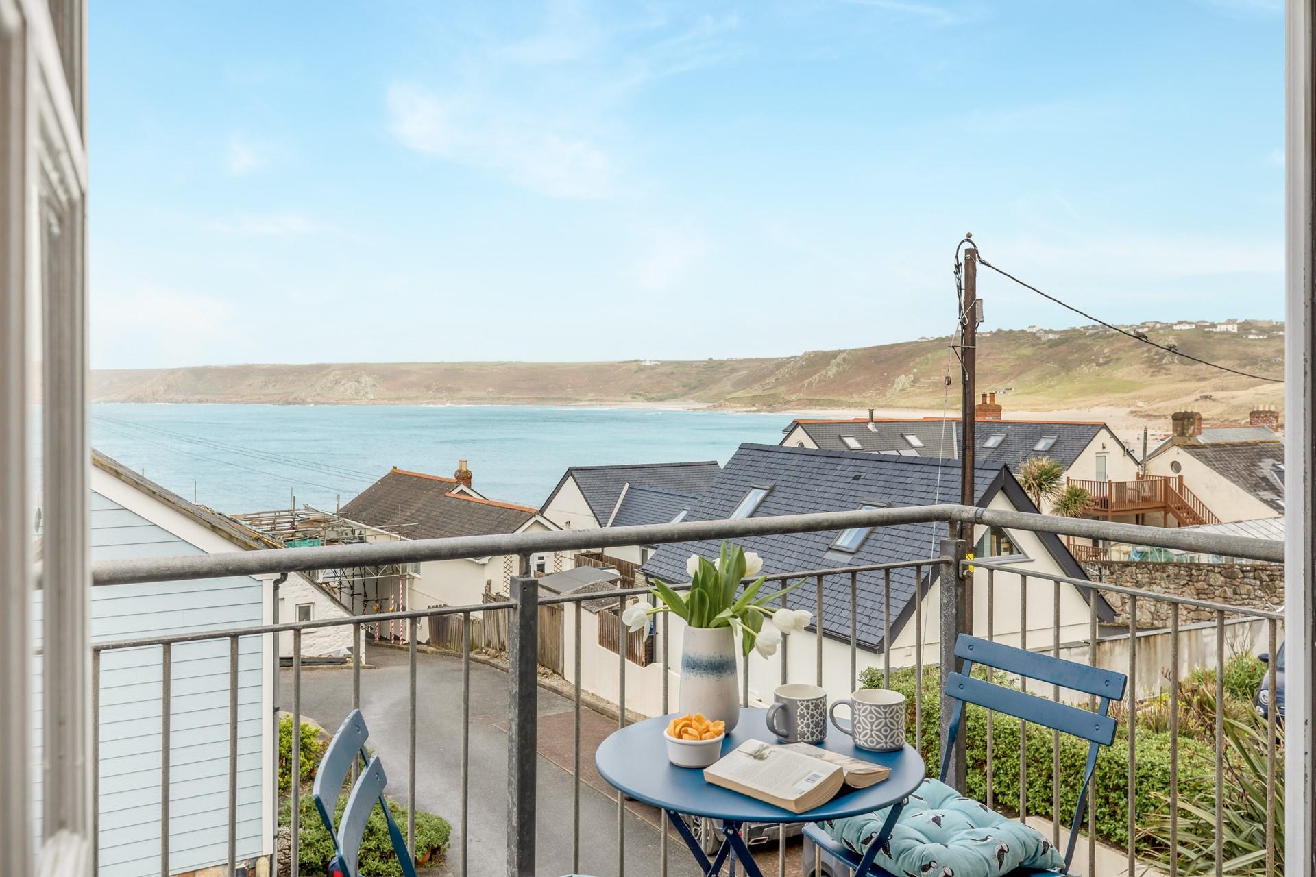 Sit on the balcony and take in the sea views.