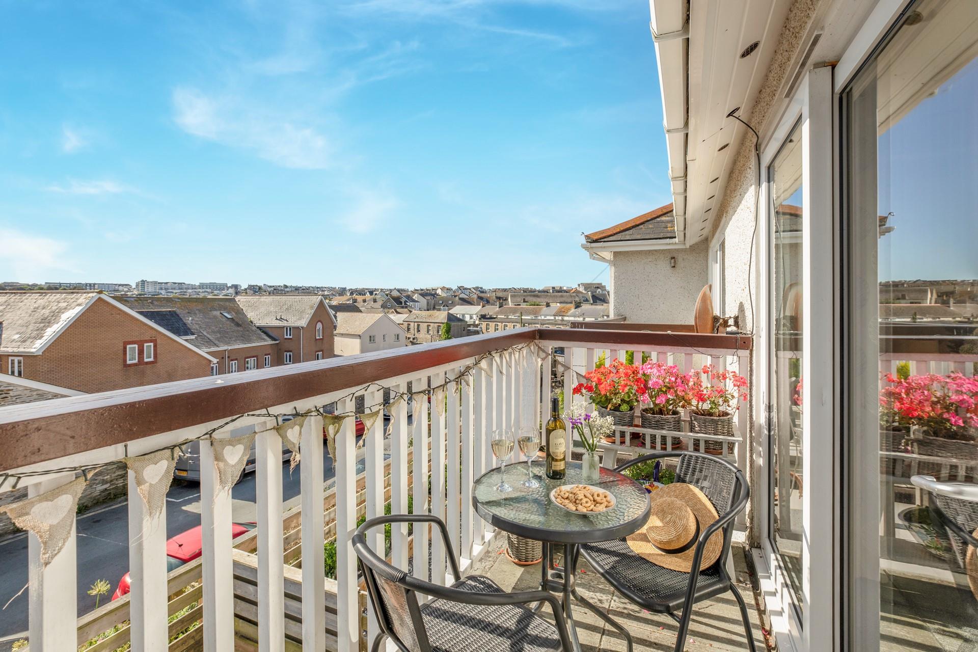 Open the patio doors and soak up the evening sun on the balcony.