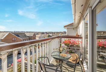 Open the patio doors and soak up the evening sun on the balcony.