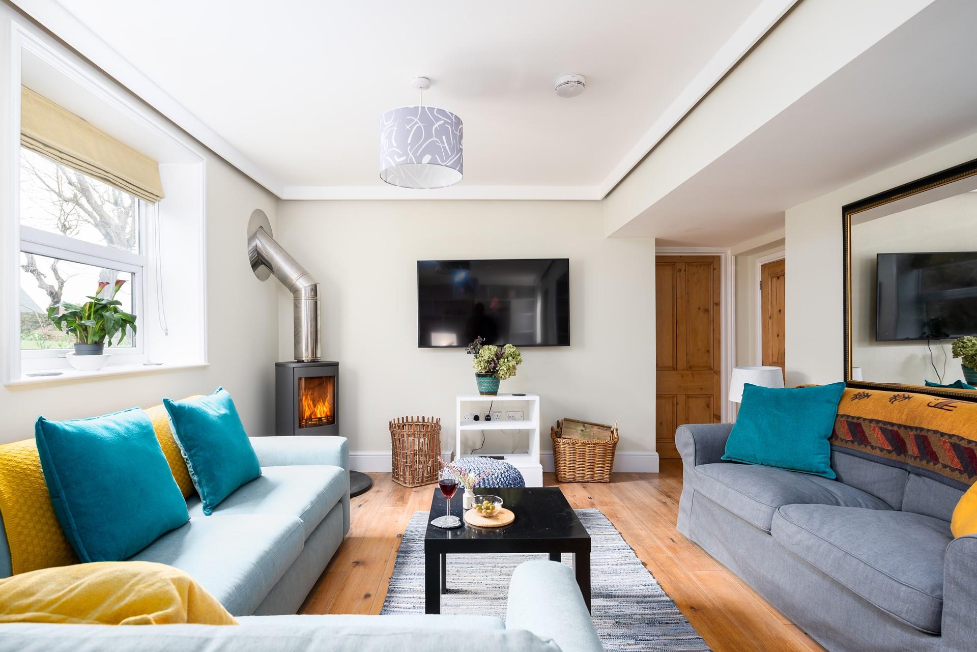 The snug is located just off the kitchen and is perfect for evenings playing games in front of the roaring fire. 