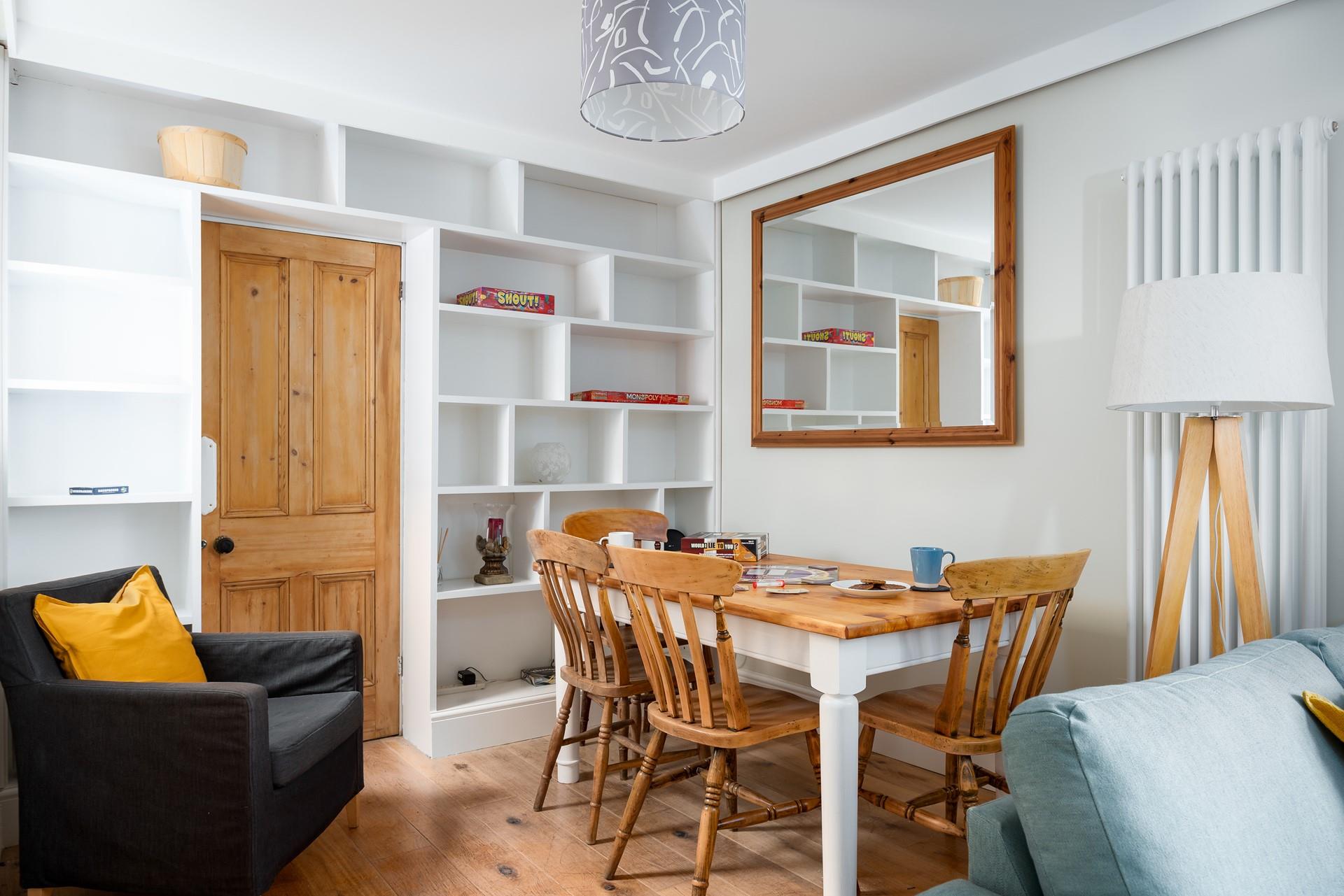 The snug area is a space to relax or where the kids can enjoy some fun board games.