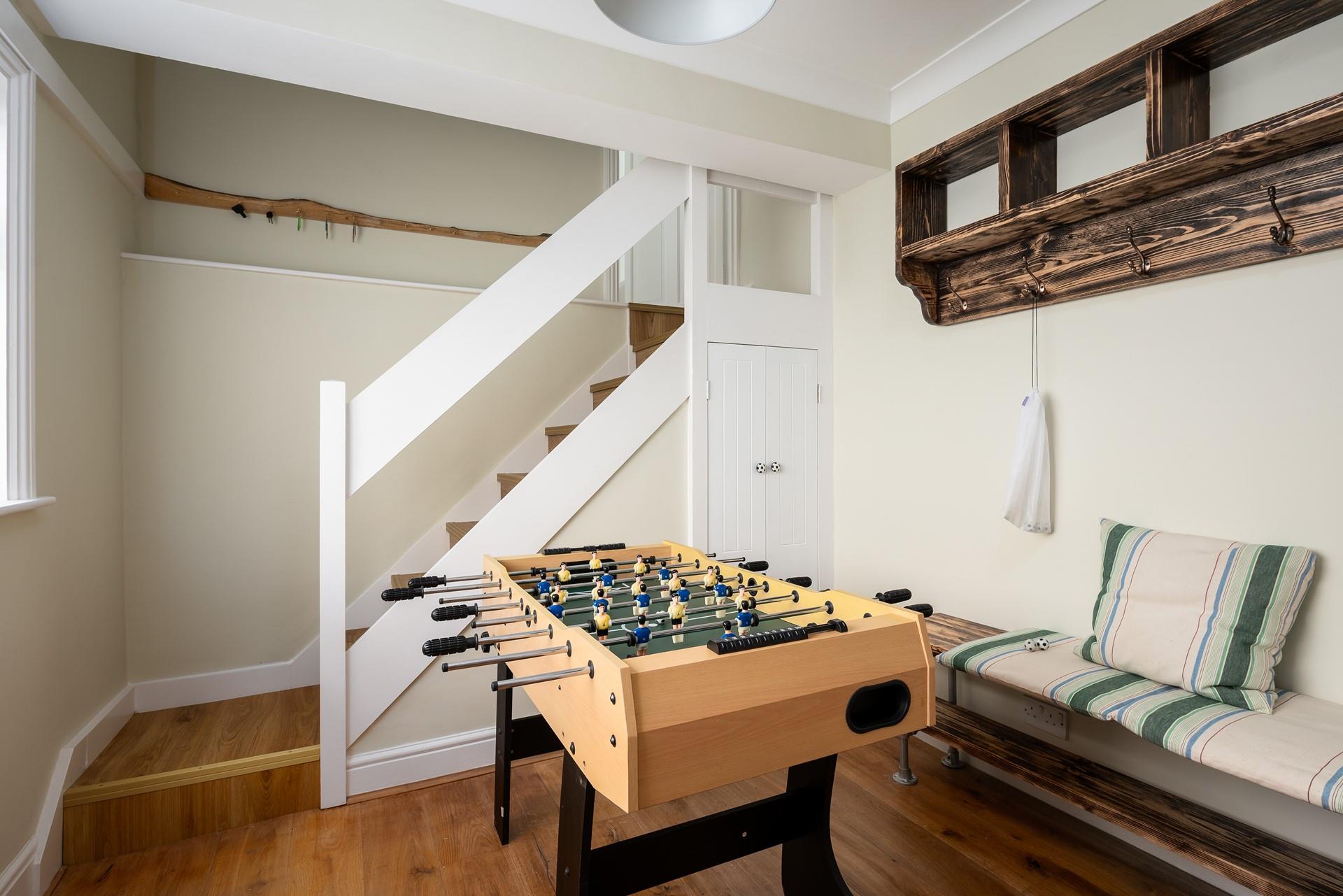A well used space, for kicking off your shoes after a stroll and getting straight into a family fun game of table football! 