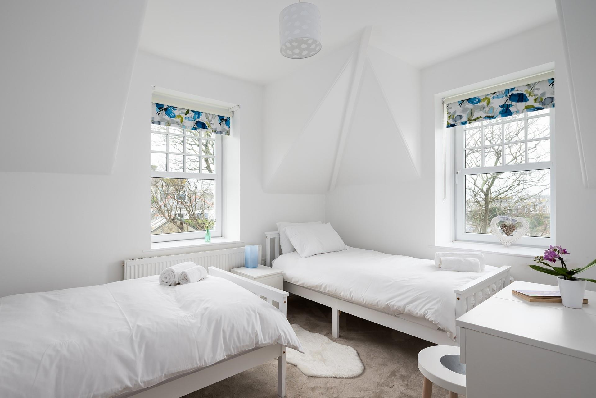 Located at the front of the house, bedroom 5 has wonderful views to wake up to. 