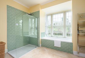 Wash off the sand from a day at the beach in the large walk in rainfall shower.