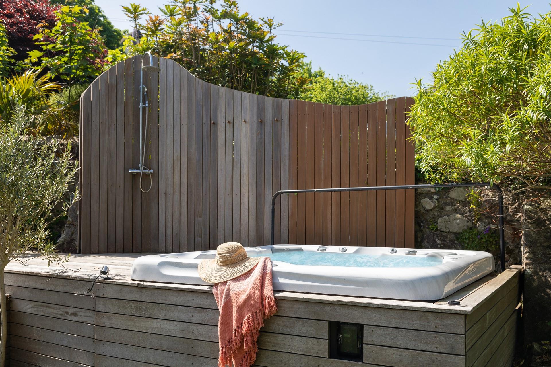 Pour yourself a drink and take a dip in the hot tub whilst the sun goes down.