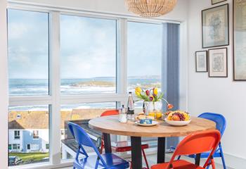 Funky, colourful touches add character to this super stylish space, where you can enjoy views of Fistral whilst enjoying dinner. 