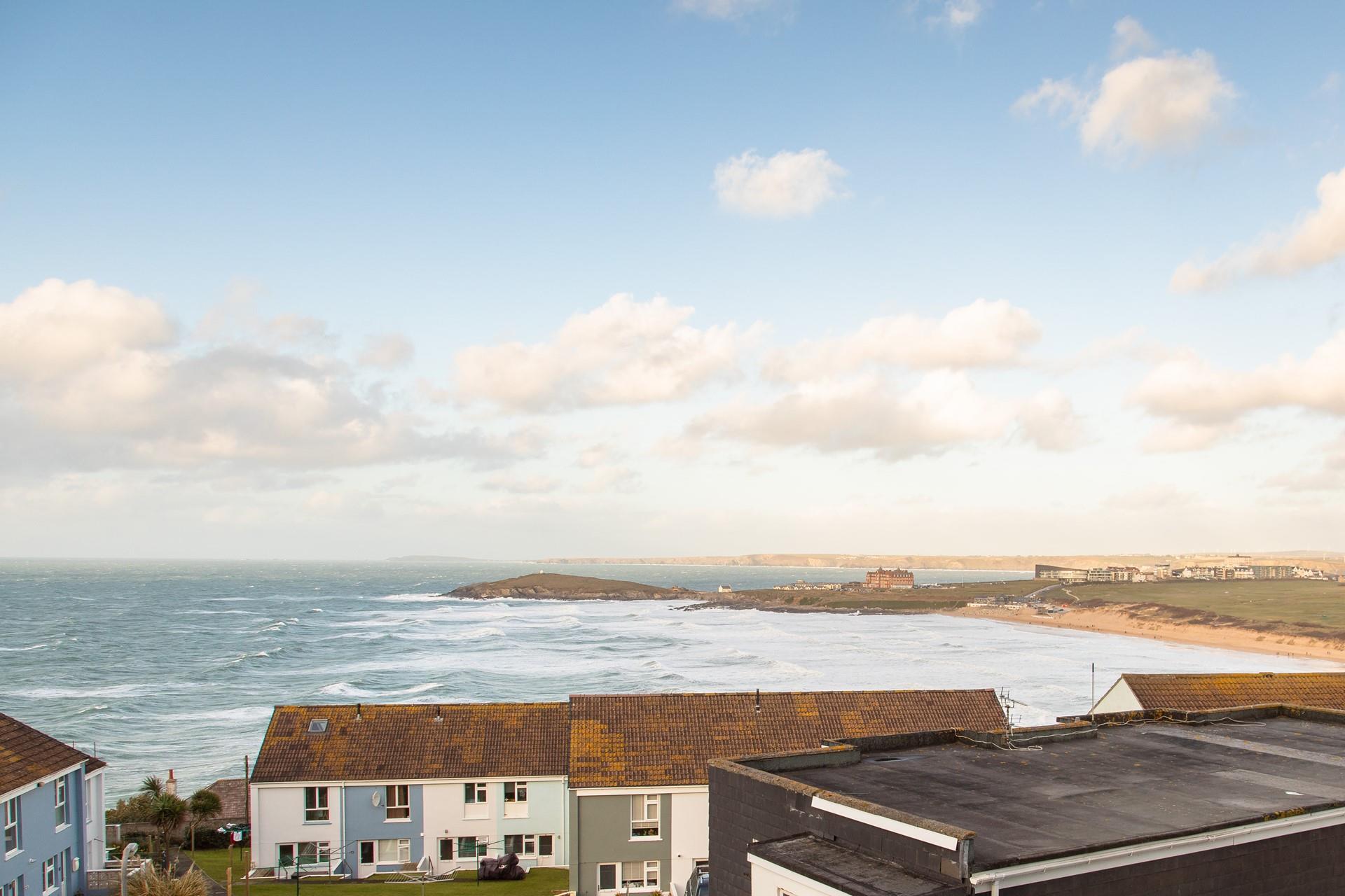 Gaze across the rooftops towards Fistral beach and the stretch of north coast beyond. 