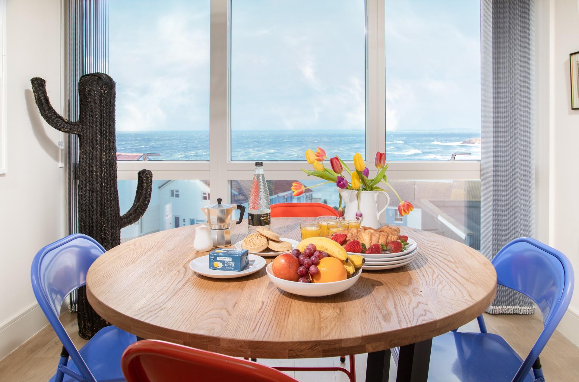 Gaze out at the waves rolling onto Fistral beach over a delicious fresh breakfast.