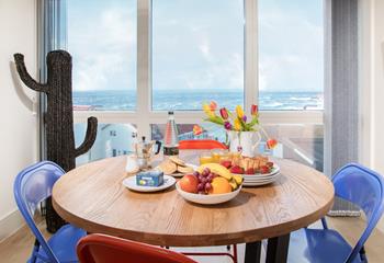 Gaze out at the waves rolling onto Fistral beach over a delicious fresh breakfast.