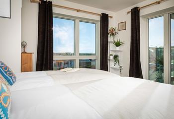 There are doors to the front balcony from both bedrooms, so you can step out of bed into the fresh Cornish air. 