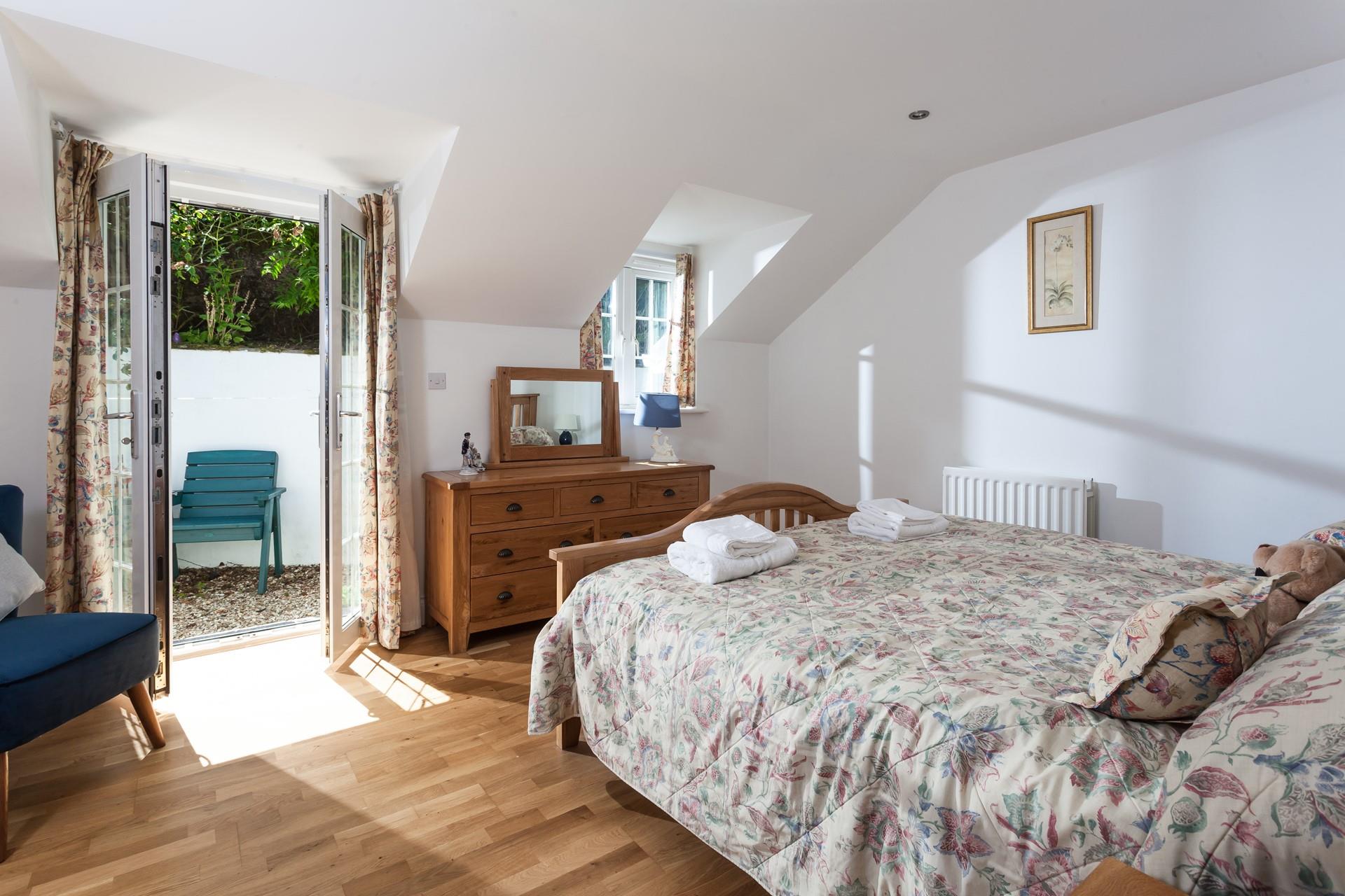 Classic prints and traditional furniture give the bedroom a homely feel, ensuring you can relax and get a great night's sleep.