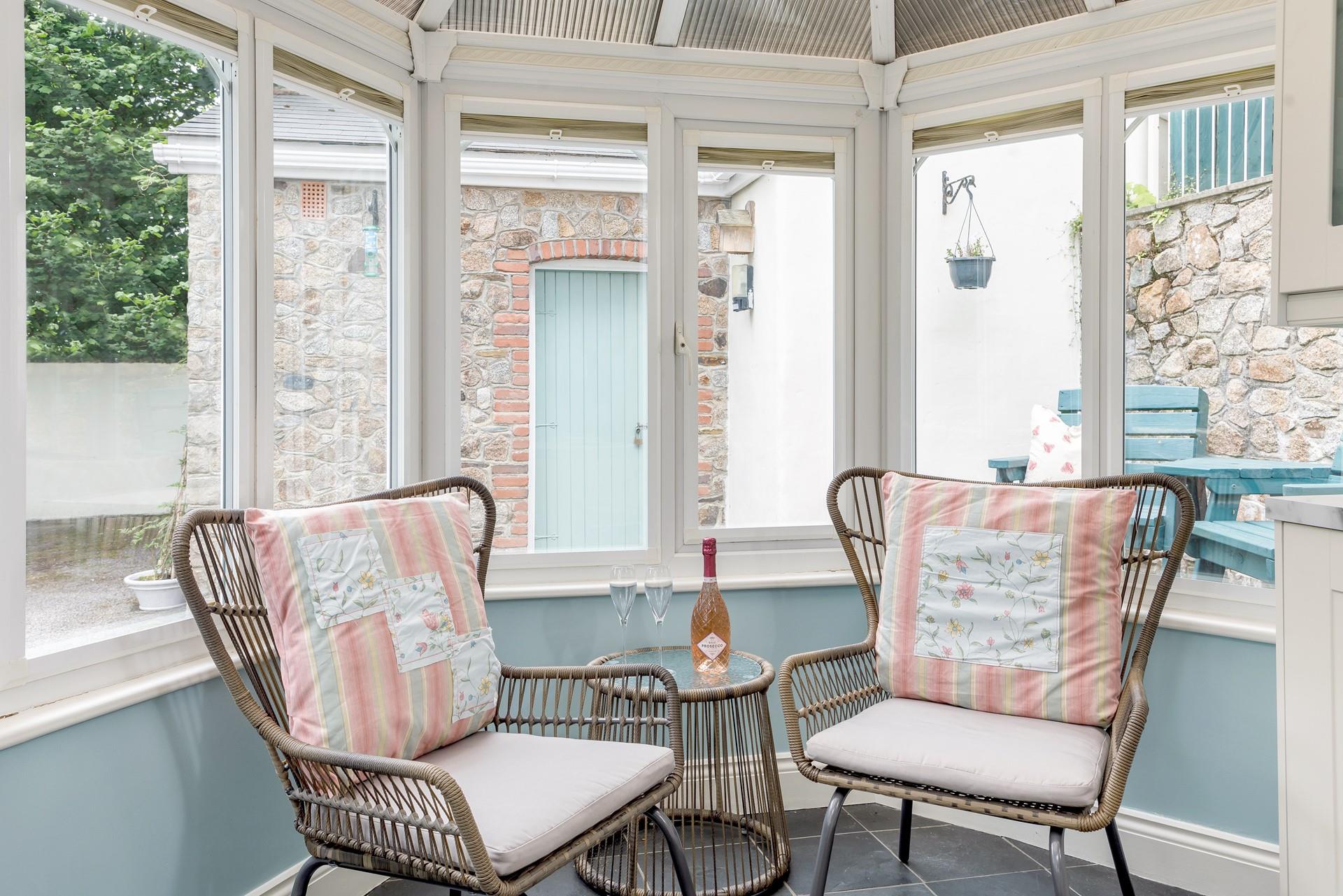 End the day with a glass of your favourite wine in the comfy window chairs.