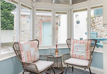 End the day with a glass of your favourite wine in the comfy window chairs.