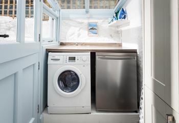 There is a fridge and washing machine in the utility room.