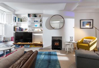 Put a film on the TV and enjoy a family movie night with the electric fire creating a cosy feel to the evening.