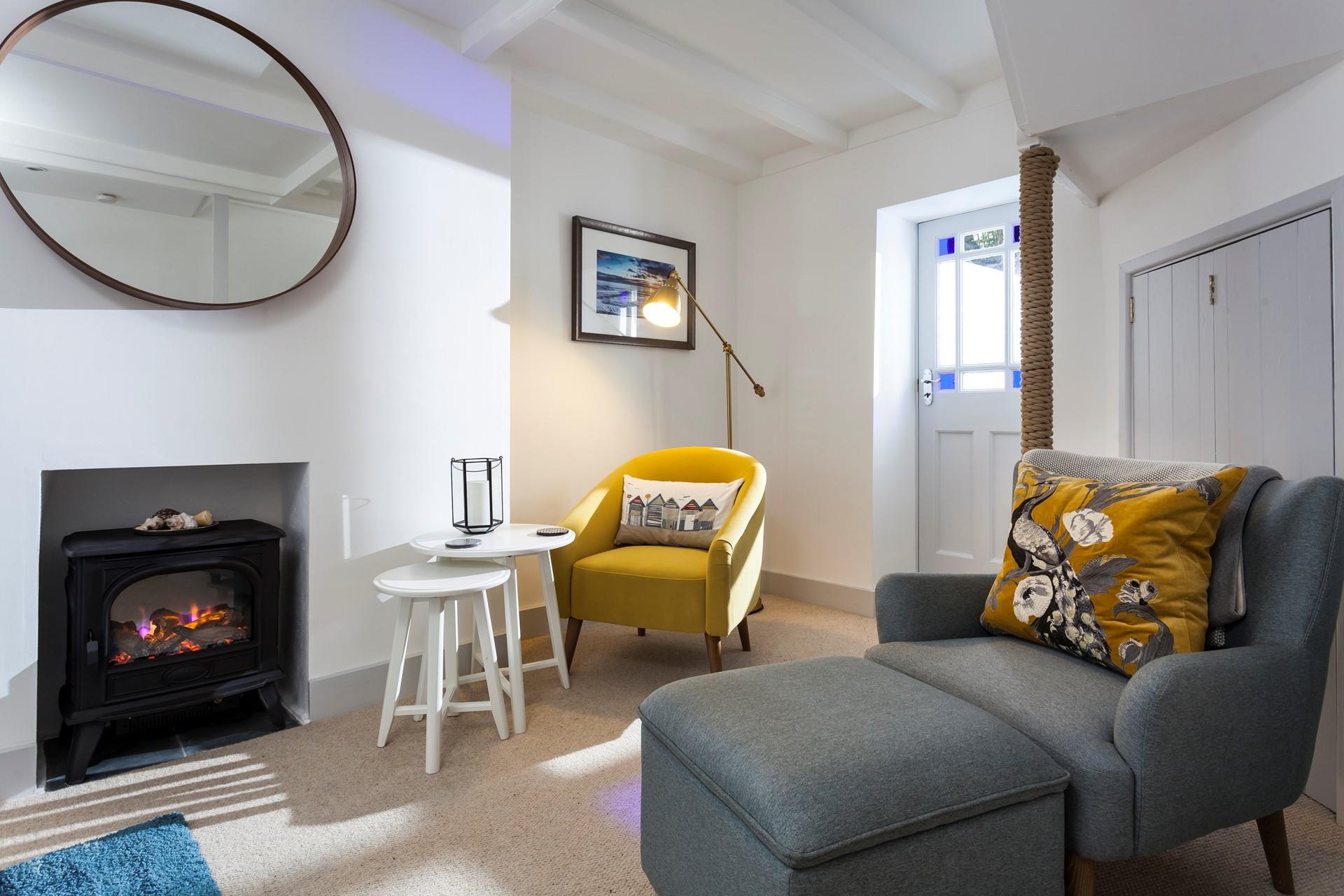 Rest your weary legs from a coast path hike and enjoy a glass of something cold.