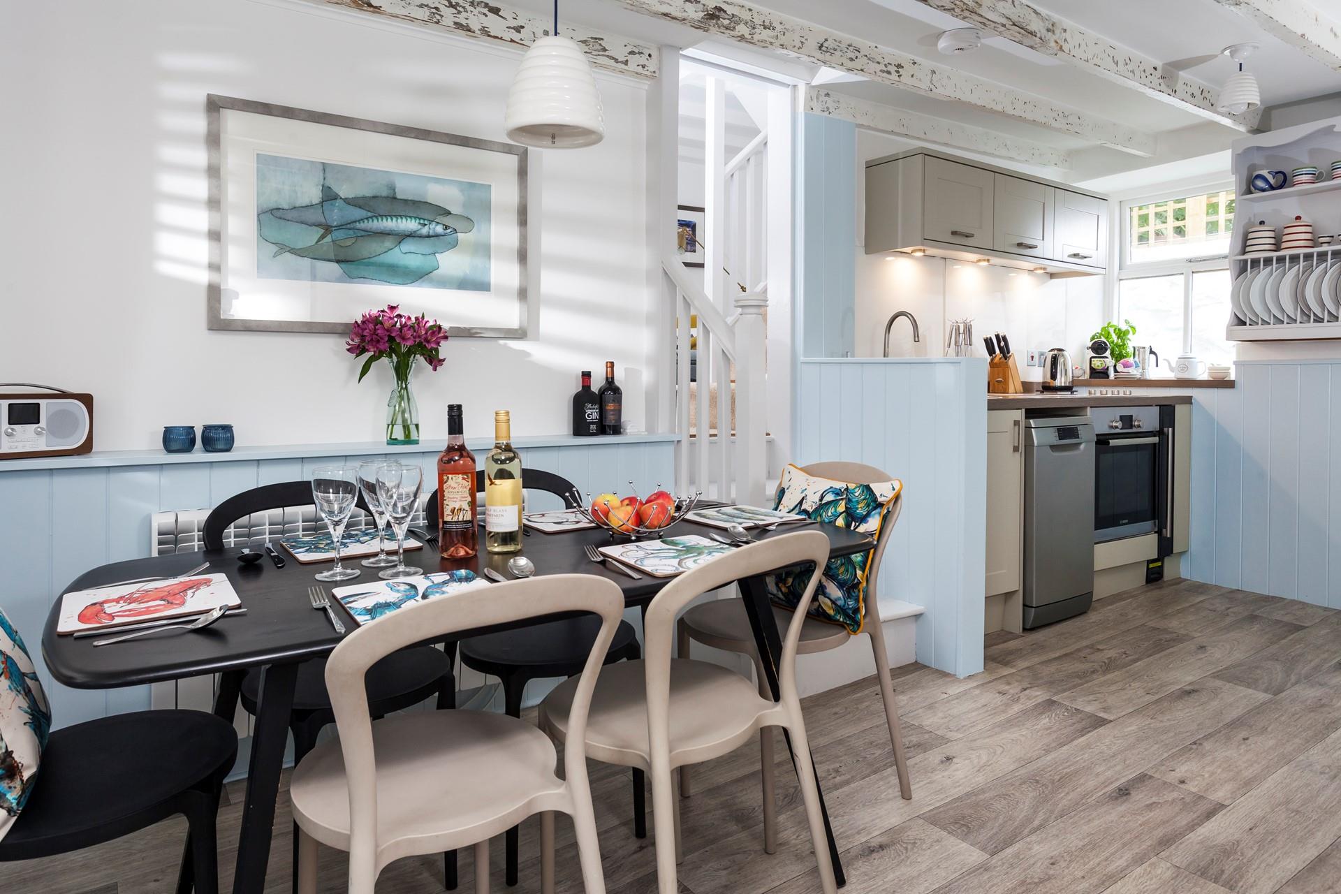 Rustic features create a homely feel in the kitchen/dining room.