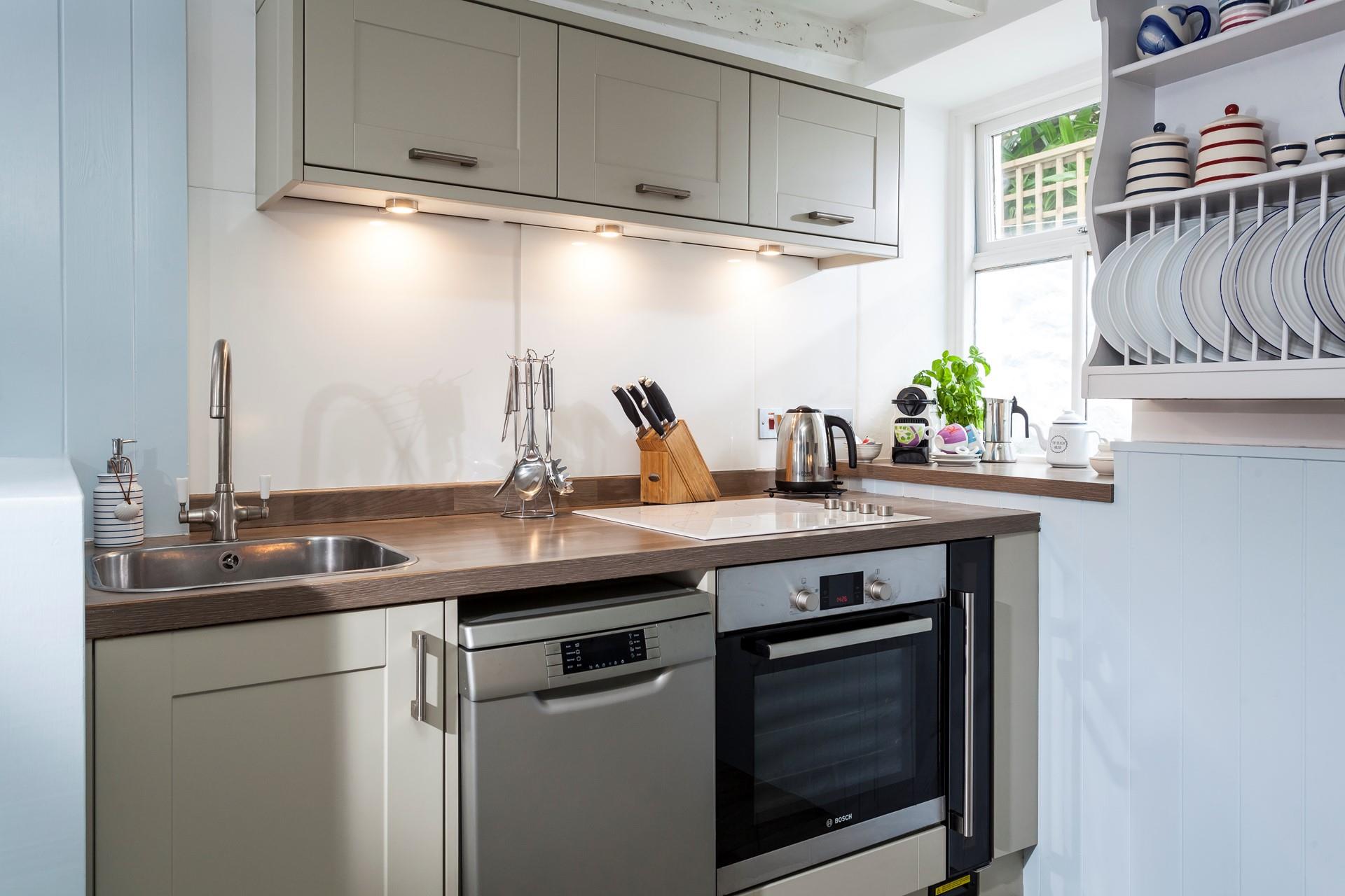 The modern kitchen is fully equipped for cooking, or why not head out to explore the local pubs and restaurants in the village?