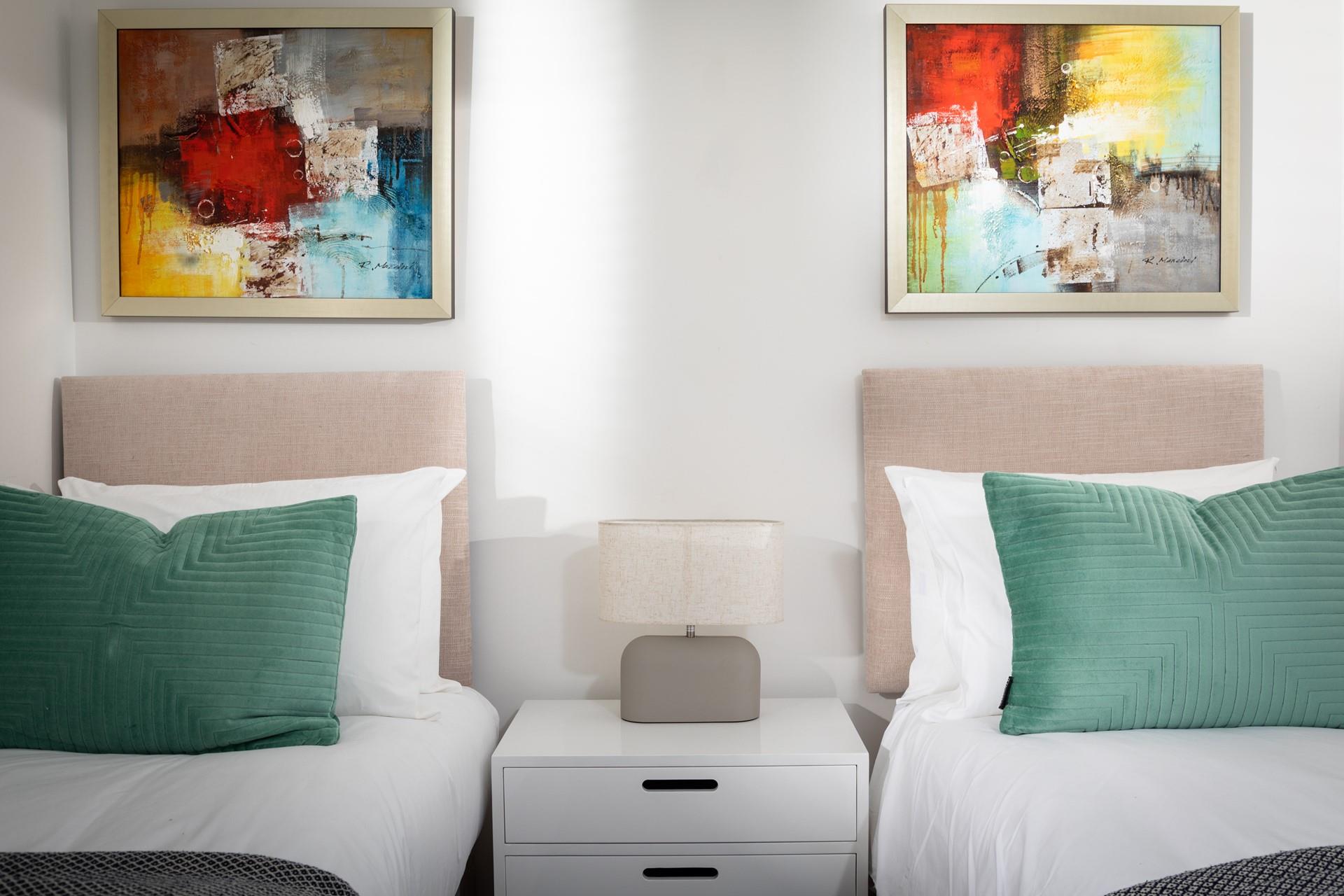 Abstract art adds a unique aspect to the rooms.