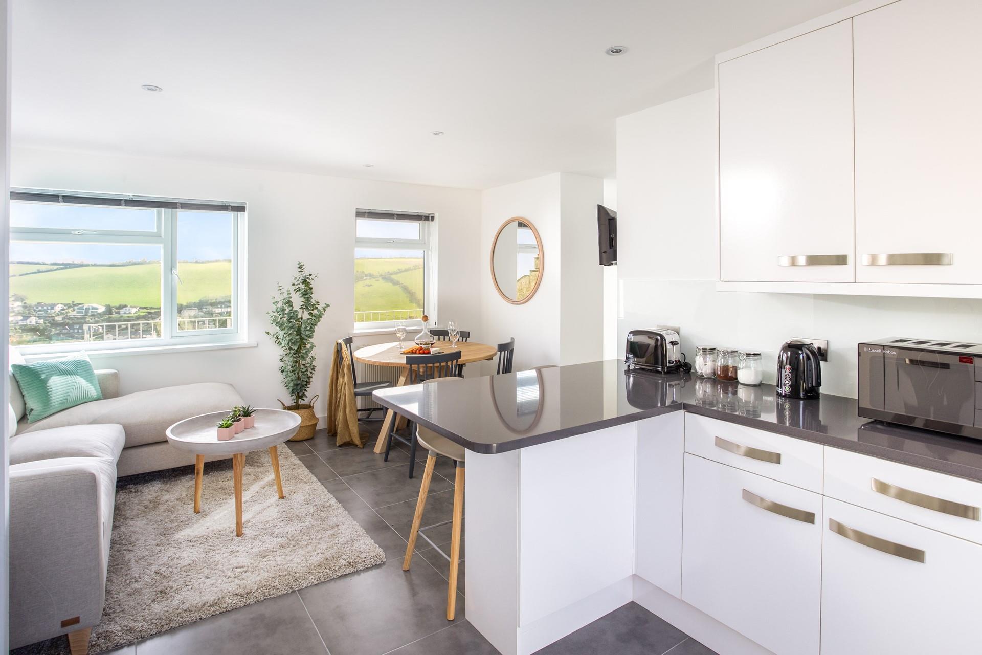 An open plan kitchen and living area maximises space and ensures the property is light and airy.
