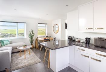 An open plan kitchen and living area maximises space and ensures the property is light and airy.