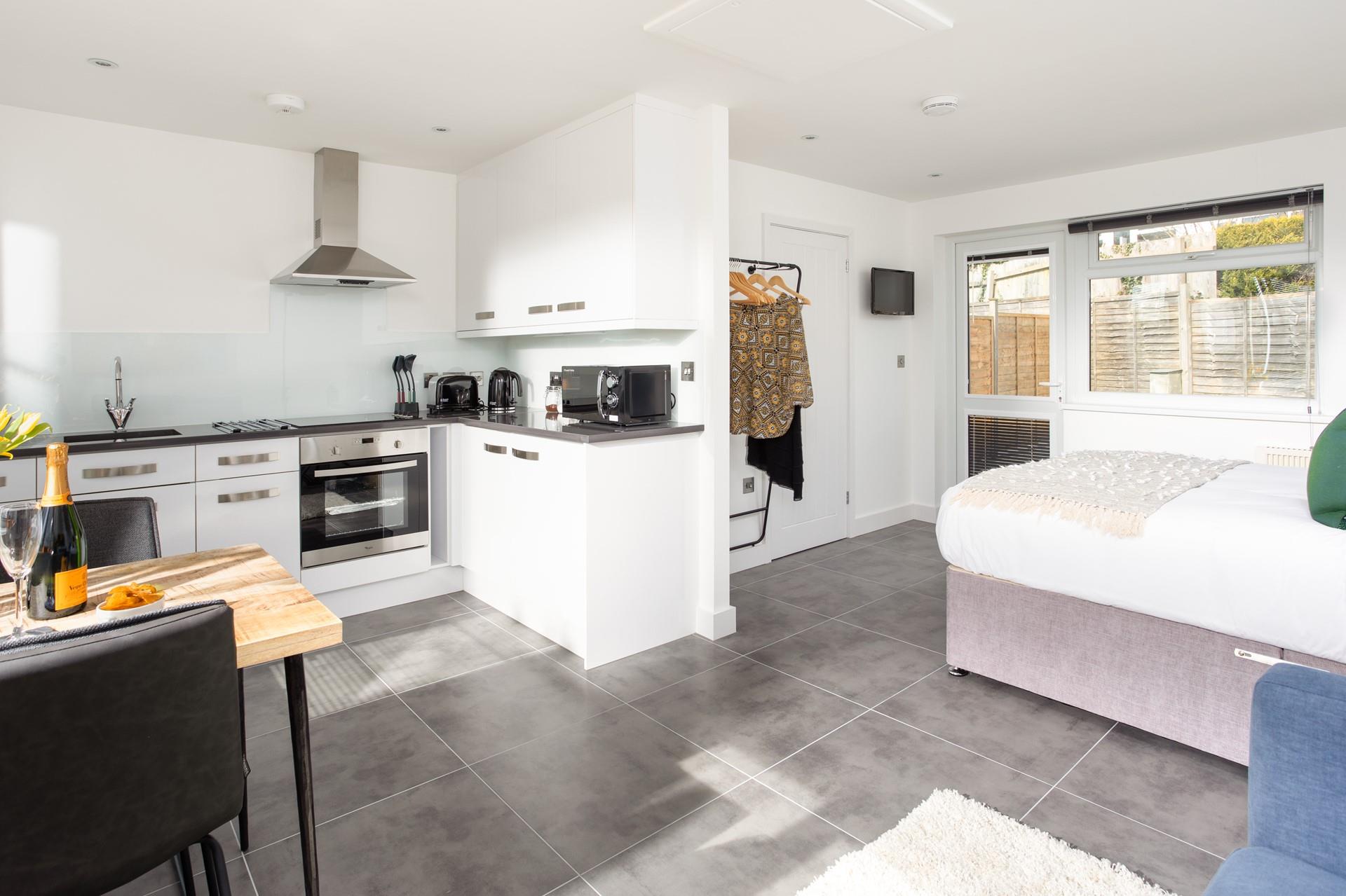 The open plan living maximises space whilst large windows ensure the property is bright and welcoming.